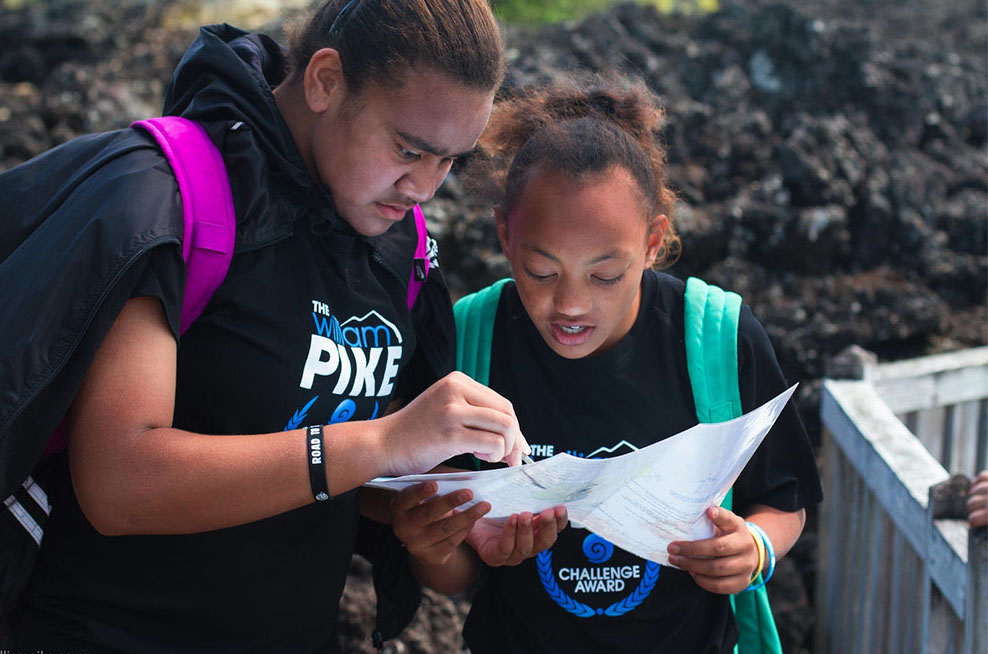 Students reading a map for William Pike Challenge Activity 